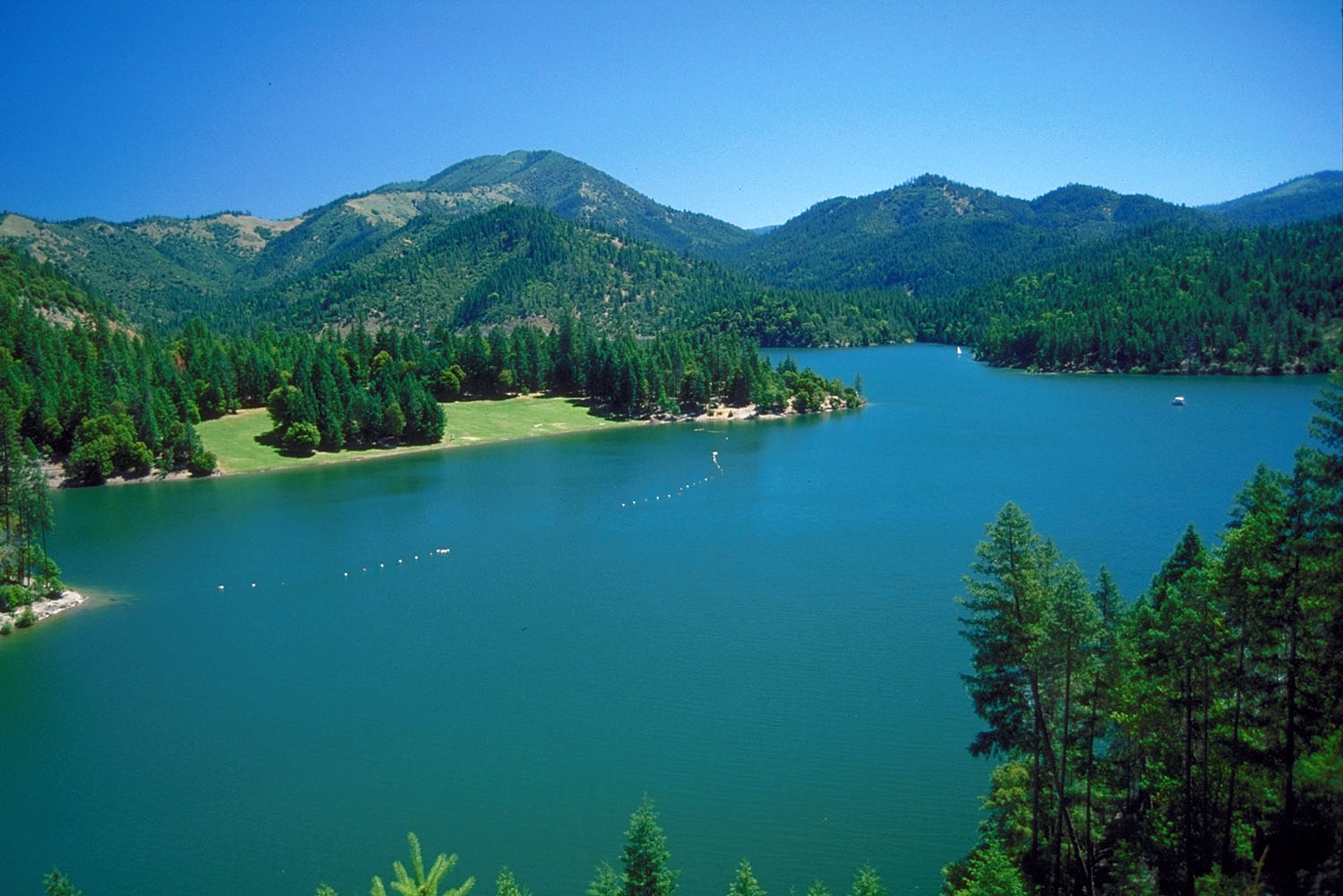 The  988-acre Applegate Lake is nestled in the heart the Applegate Valley Wine Triail. The lake makes for a picture-perfect pitstop on the Applegate tasting trail.